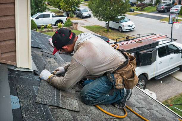 Professional Roof Leak Repair technician working in Beaverton, MI
